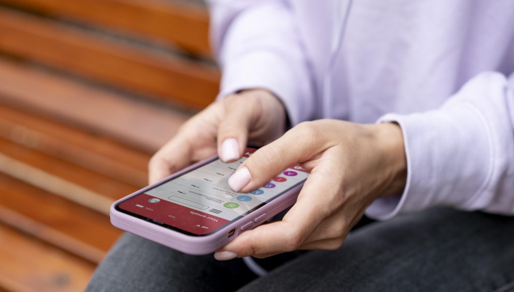 close-up-hands-holding-device