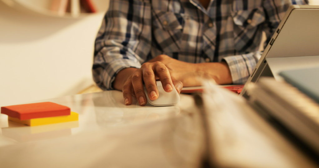 Senior Woman Suffering For Carpal Tunnel Syndrome Using Computer Mouse